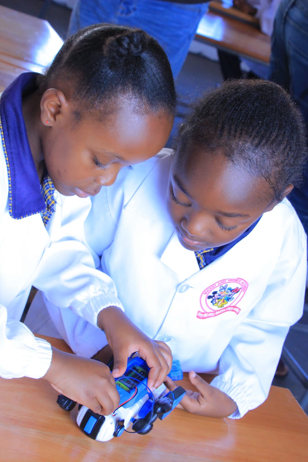 Student experiencing breakthrough moment with coding